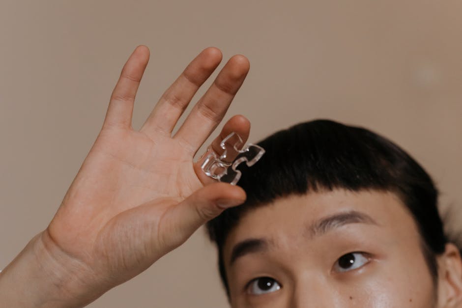 An image of a person holding a puzzle piece with the words 'transferable skills' on it, representing how these skills fit in multiple industries.